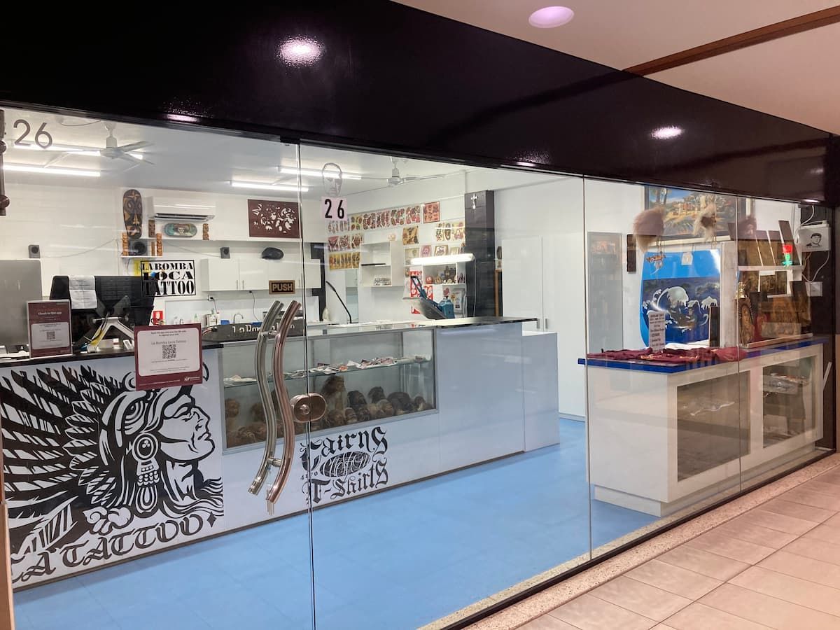 A Store Front With a Display Case — La Bomba Loca Tattoo in Cairns City, QLD
