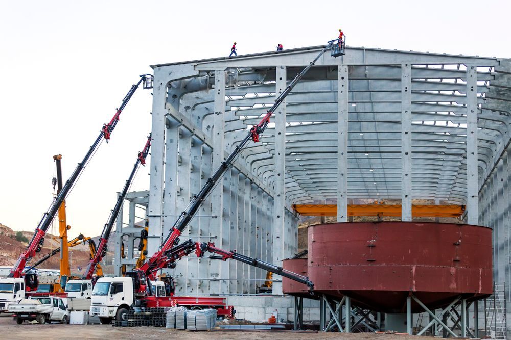 Lot of Hiab Cranes Are Working in the Construction Site — Norfab In Bohle, QLD
