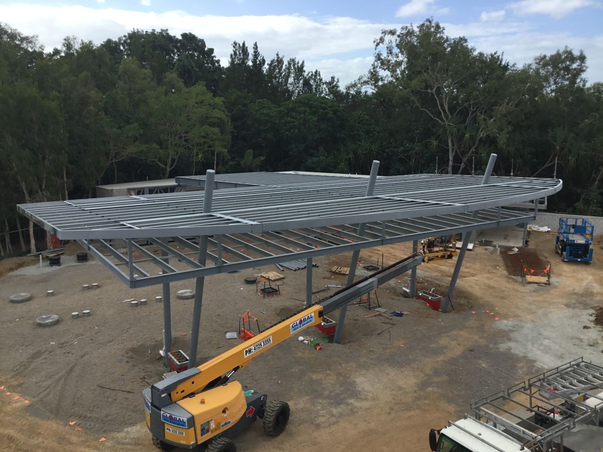 Crane Parked Beside Structural Steel Frame — Our Completed Projects in Townsville, QLD