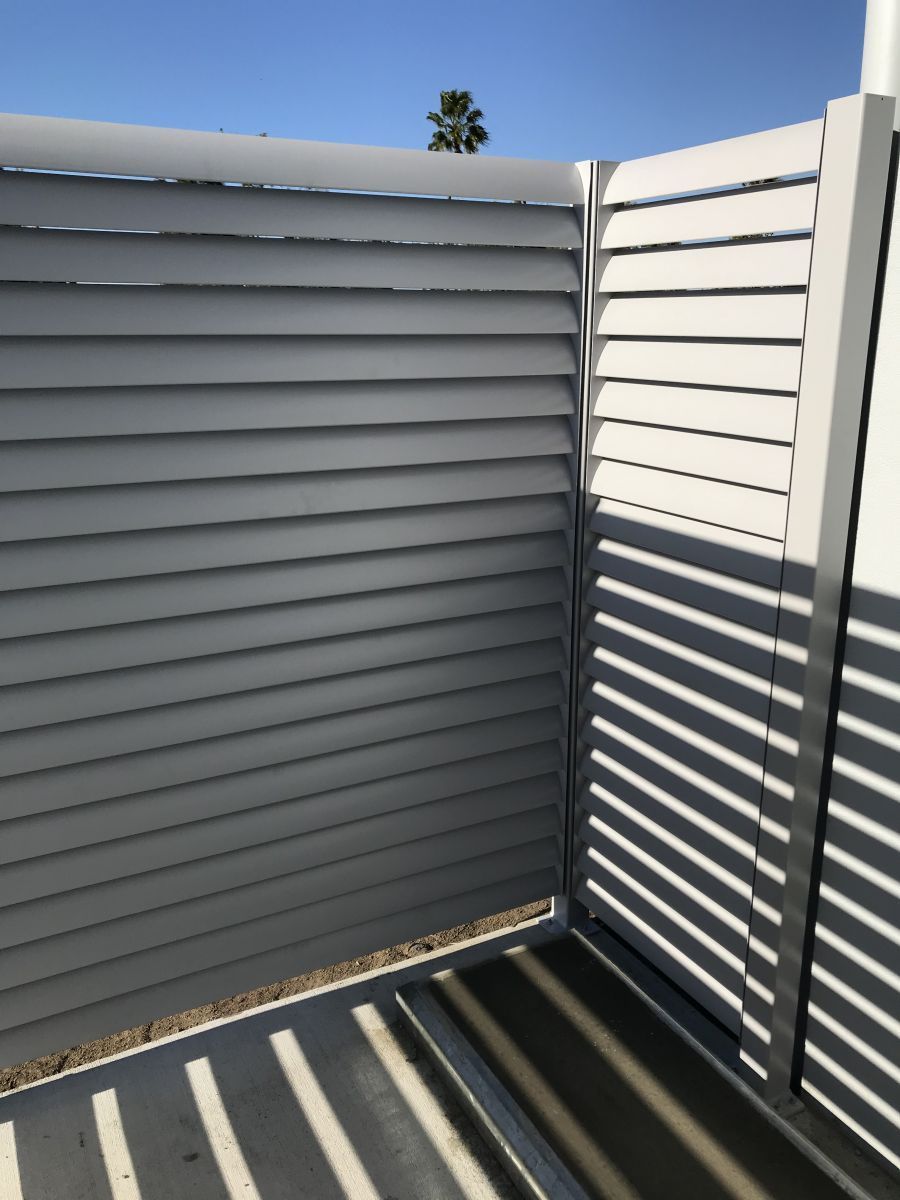 A Grey Powder-coated Aluminium Fence — Our Completed Projects in Townsville, QLD