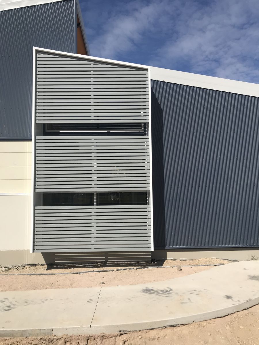 Aluminium Screens on Side of Building — Our Completed Projects in Townsville, QLD