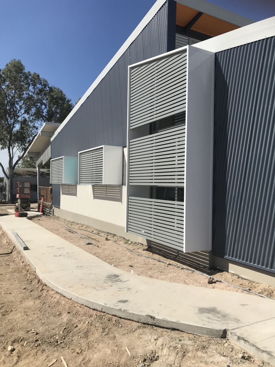 Grey Window Awnings and Screens Made From Aluminium — Our Completed Projects in Townsville, QLD
