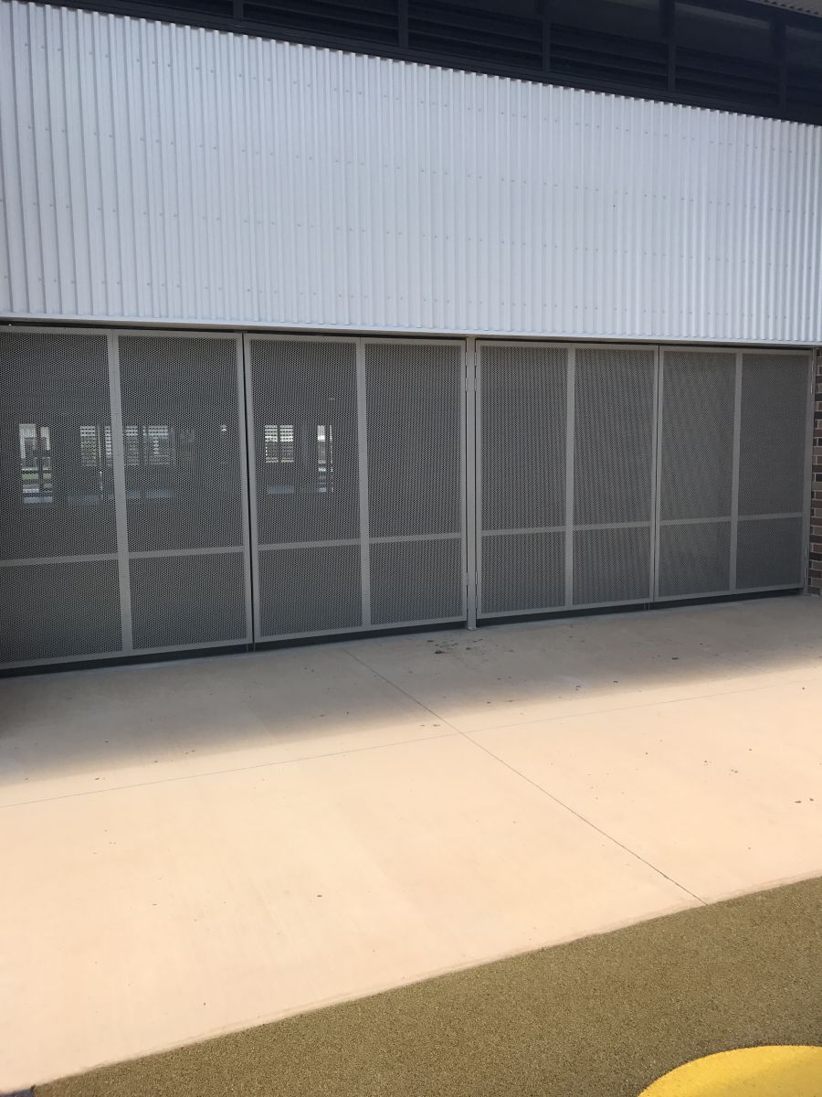 Perforated Aluminium Roller Doors for Car Park — Our Completed Projects in Townsville, QLD
