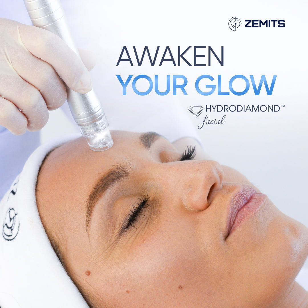 A woman is getting a hydro diamond treatment on her face