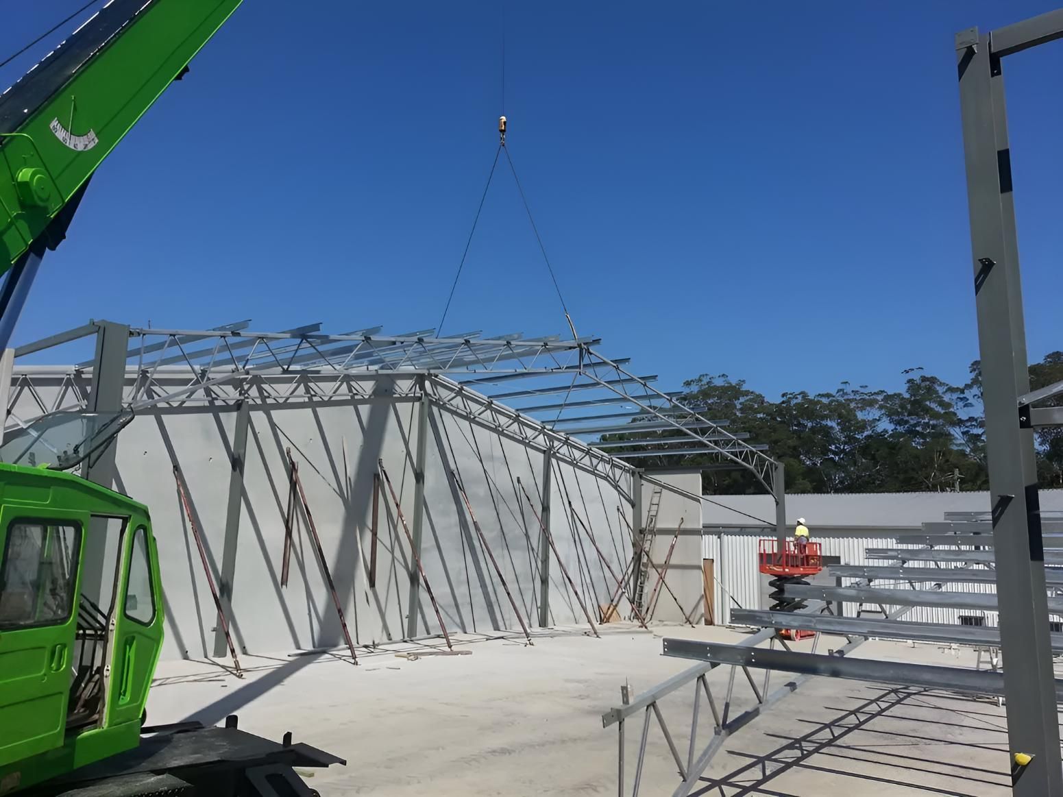 A Kitchen With White Cabinets and a Large White Island — Aspex Construction - Lou Pieren In Port Macquarie, NSW