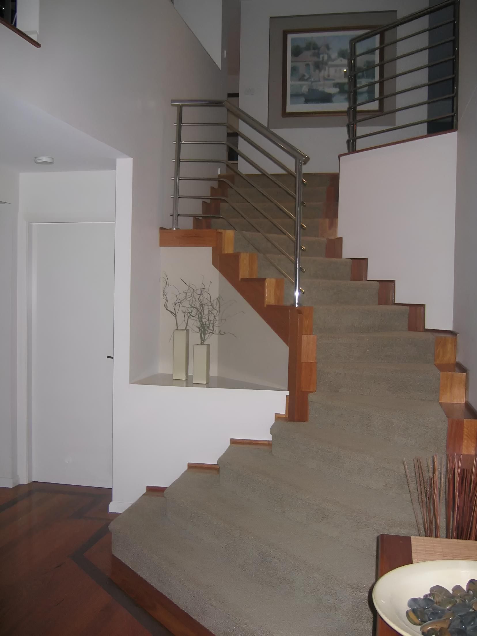 A Staircase With a Picture on the Wall Above It — Aspex Construction - Lou Pieren In Port Macquarie, NSW