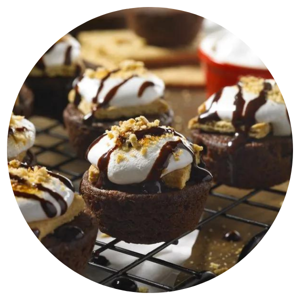 S'mores cupcakes are sitting on a cooling rack
