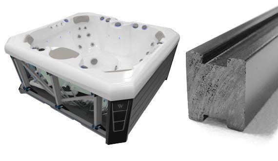 Hot tub next to a close-up of dark gray decking material. White tub interior, black exterior panels.