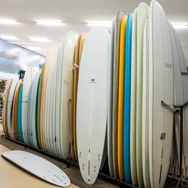 Long Boards Displayed at the Shop — Surf Shop in Erina, NSW