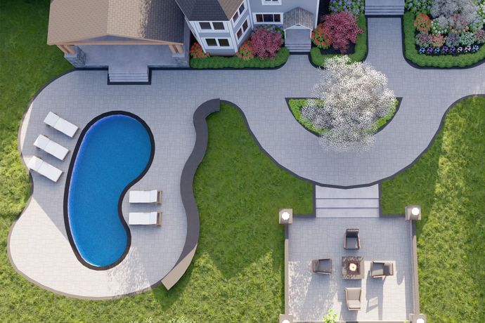 An aerial view of a house with a pool and patio.