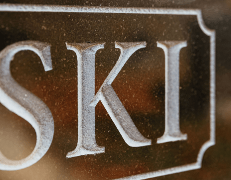 A close up of a sign that says ski on it.