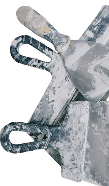 Three spatulas are stacked on top of each other on a white background.