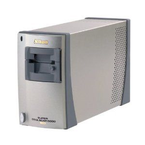 A camera and some other items on a table