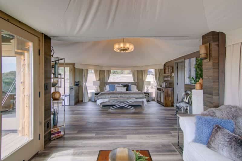 There is a large bed in the middle of the room.