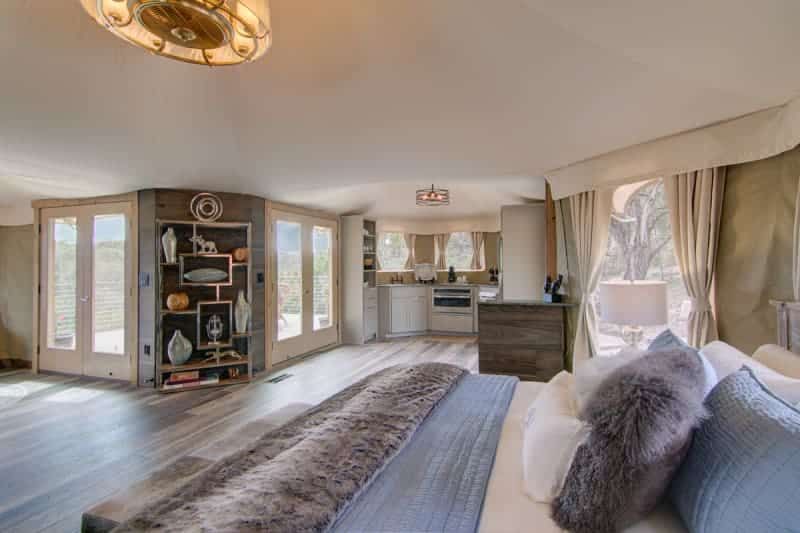 There is a large bed in the middle of the room.