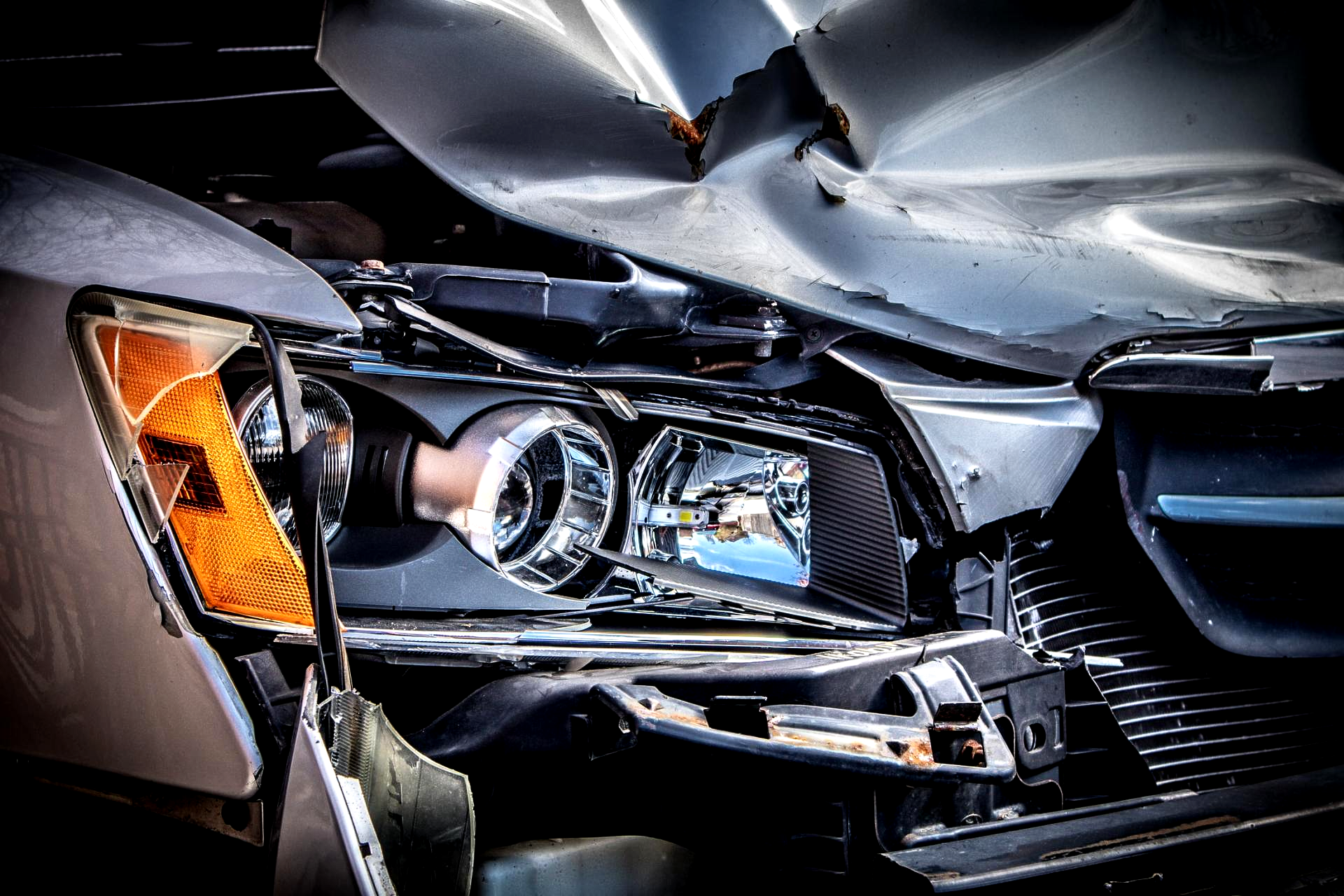 A close up of a car that has been damaged in an accident.
