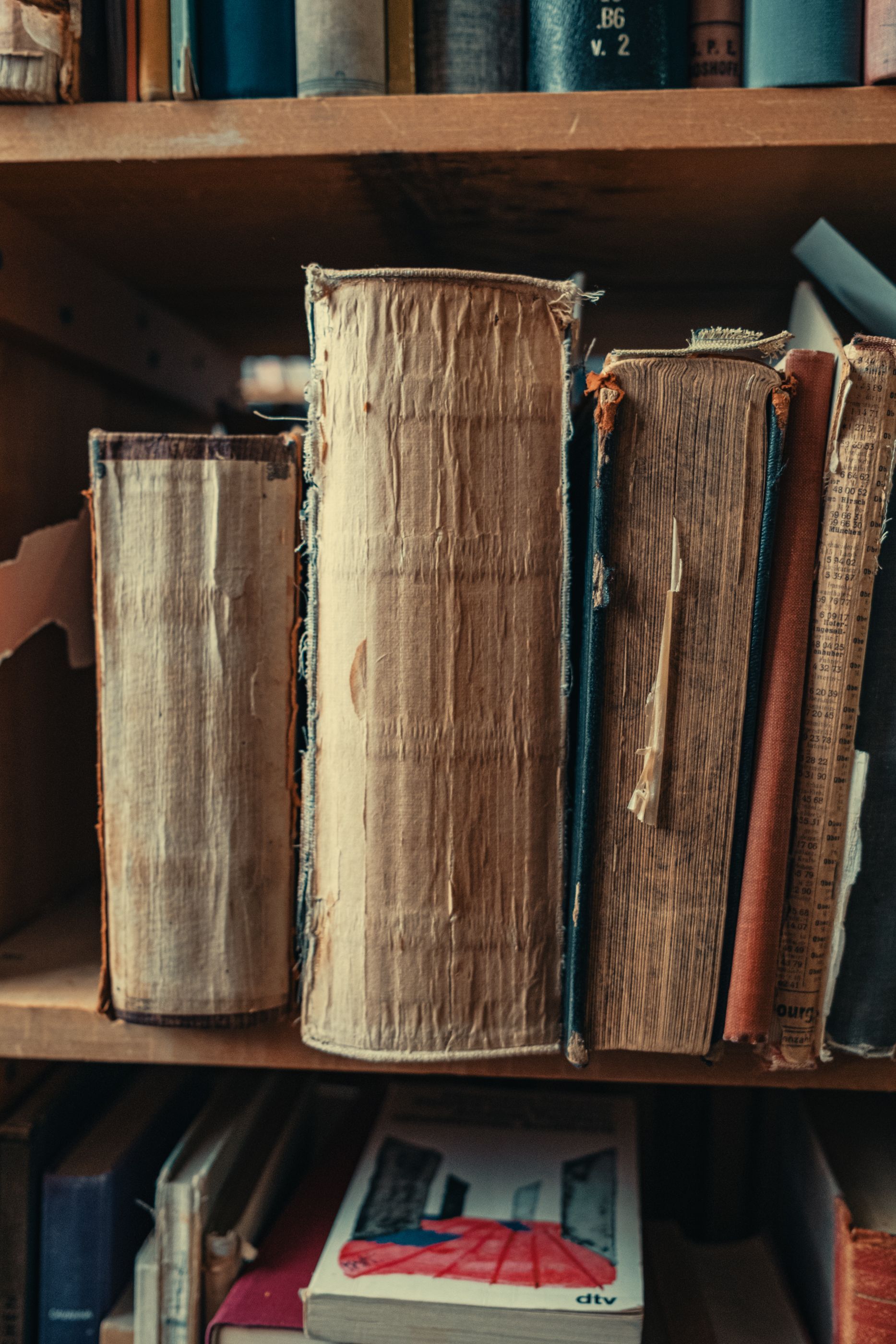 A pile of books with one being titled ' a brief history '