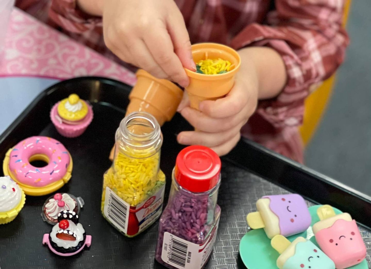 Child playing with toy food