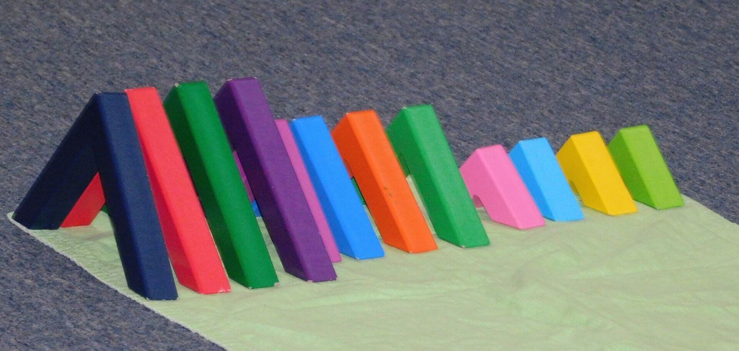 Colorful foam blocks arranged in a row,