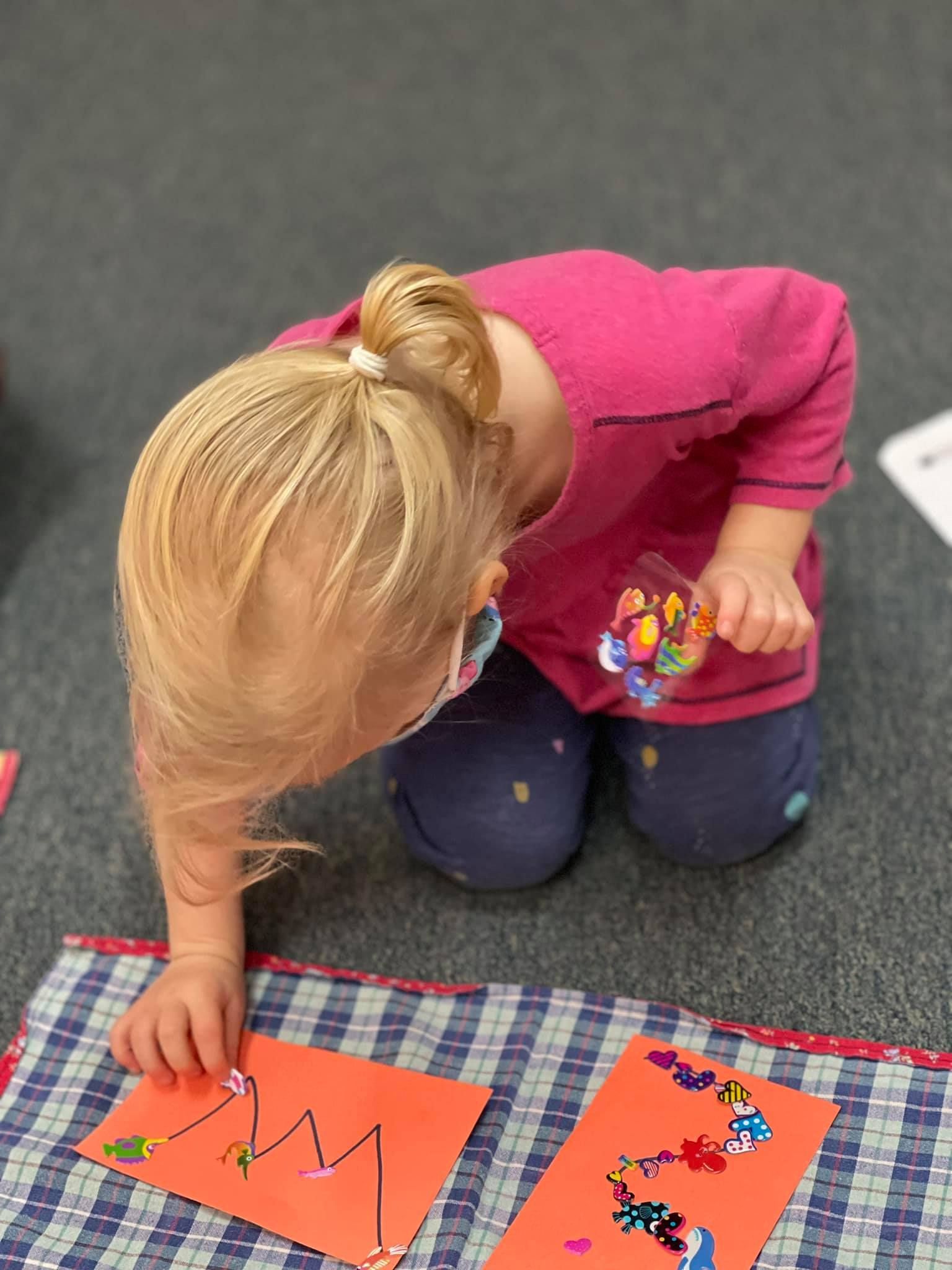 Blonde child in pink top