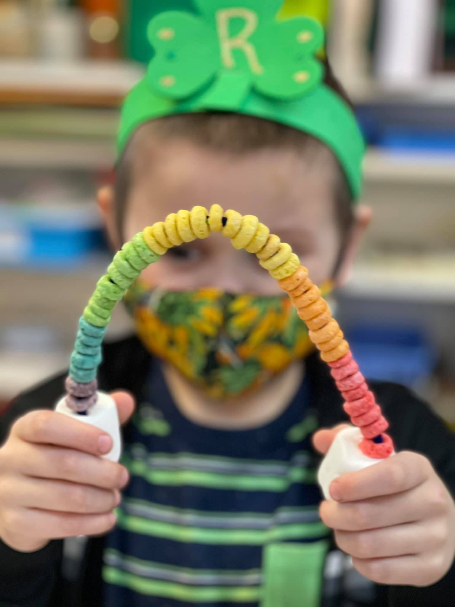Child wearing a St. Patrick's Day headband