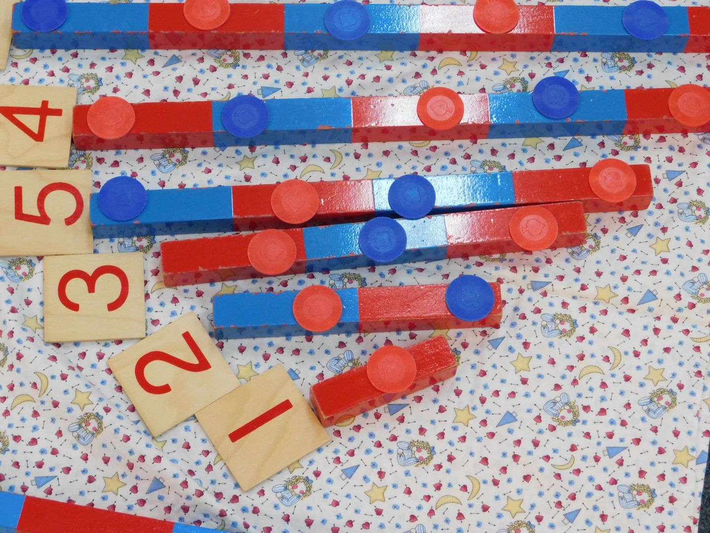 Wooden number tiles and colorful counting rods