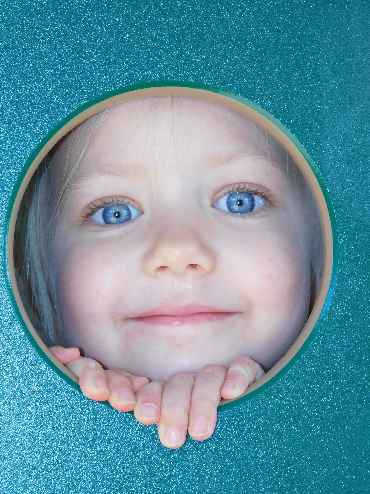 Blond-haired child with blue eyes
