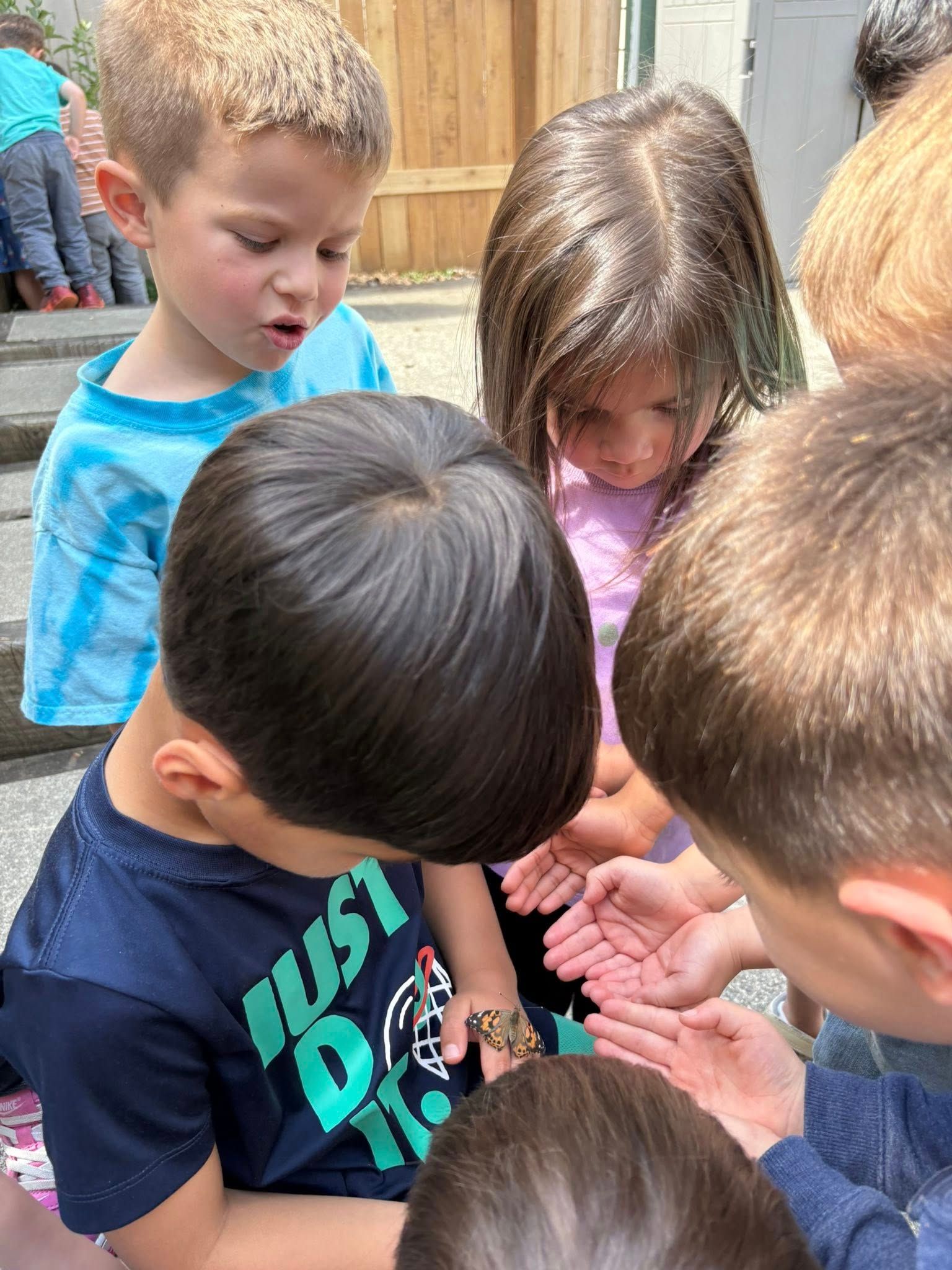 Children gather around