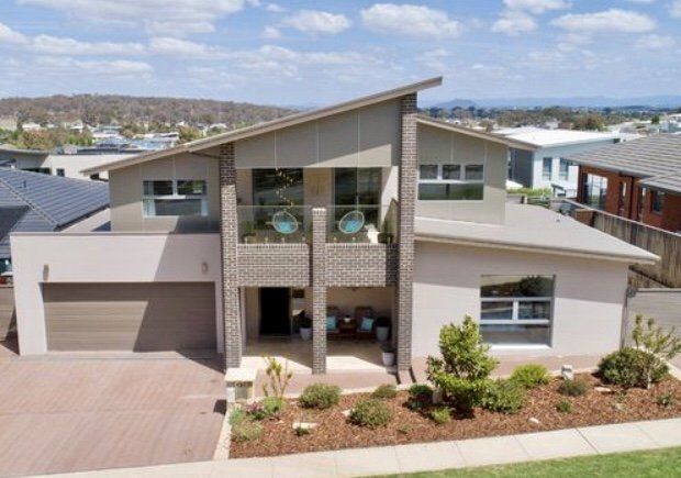 Roof Gutter On A New Tiled Roof — Your Craftsmen in Eleebana, NSW