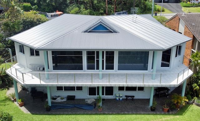 Roofer Contractor Installing And Repair Roof Gutter — Your Craftsmen in Eleebana, NSW