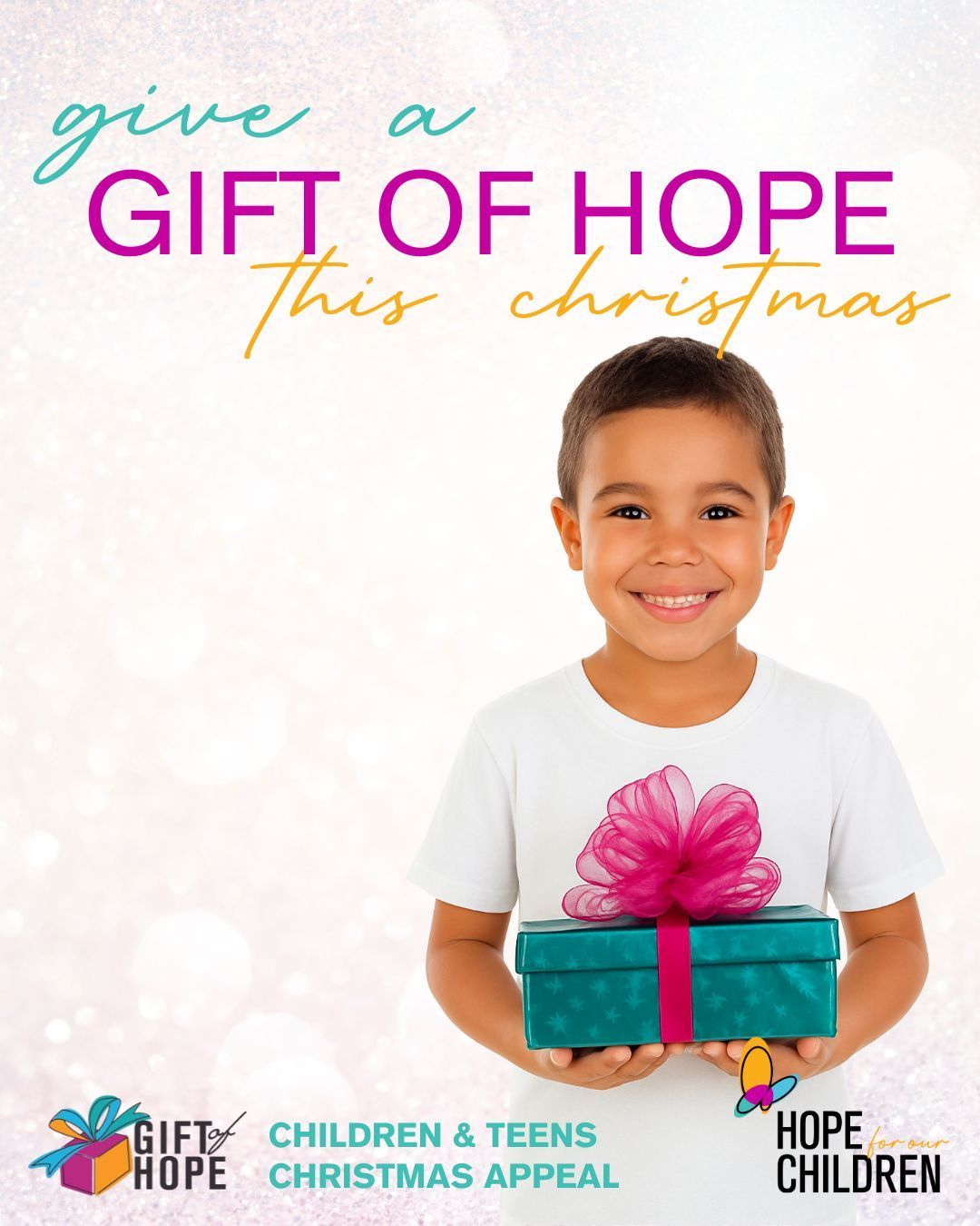 Young boy holding a present