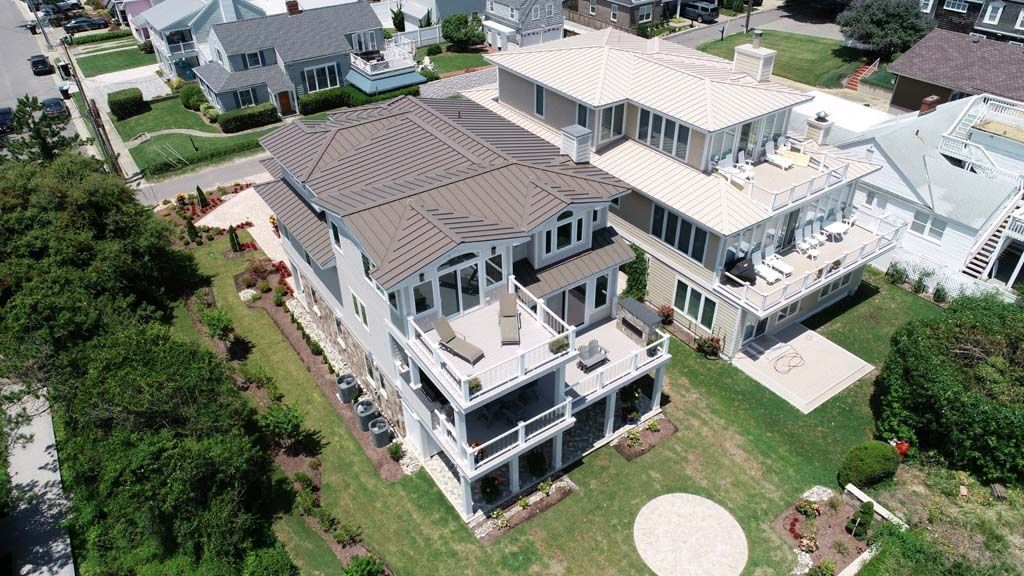 An aerial view of a row of houses in a residential area.