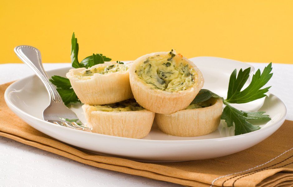 basil dill zucchini quiche in small tart shells