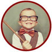 portrait of little boy with glasses smiling