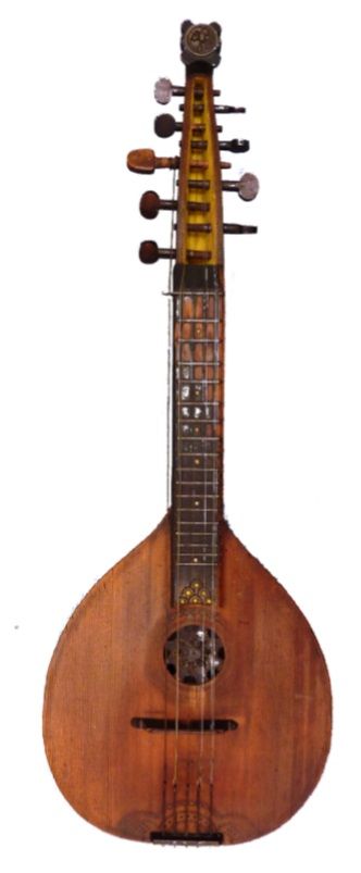 Een gitaar met een lange hals en een paar knoppen erop
