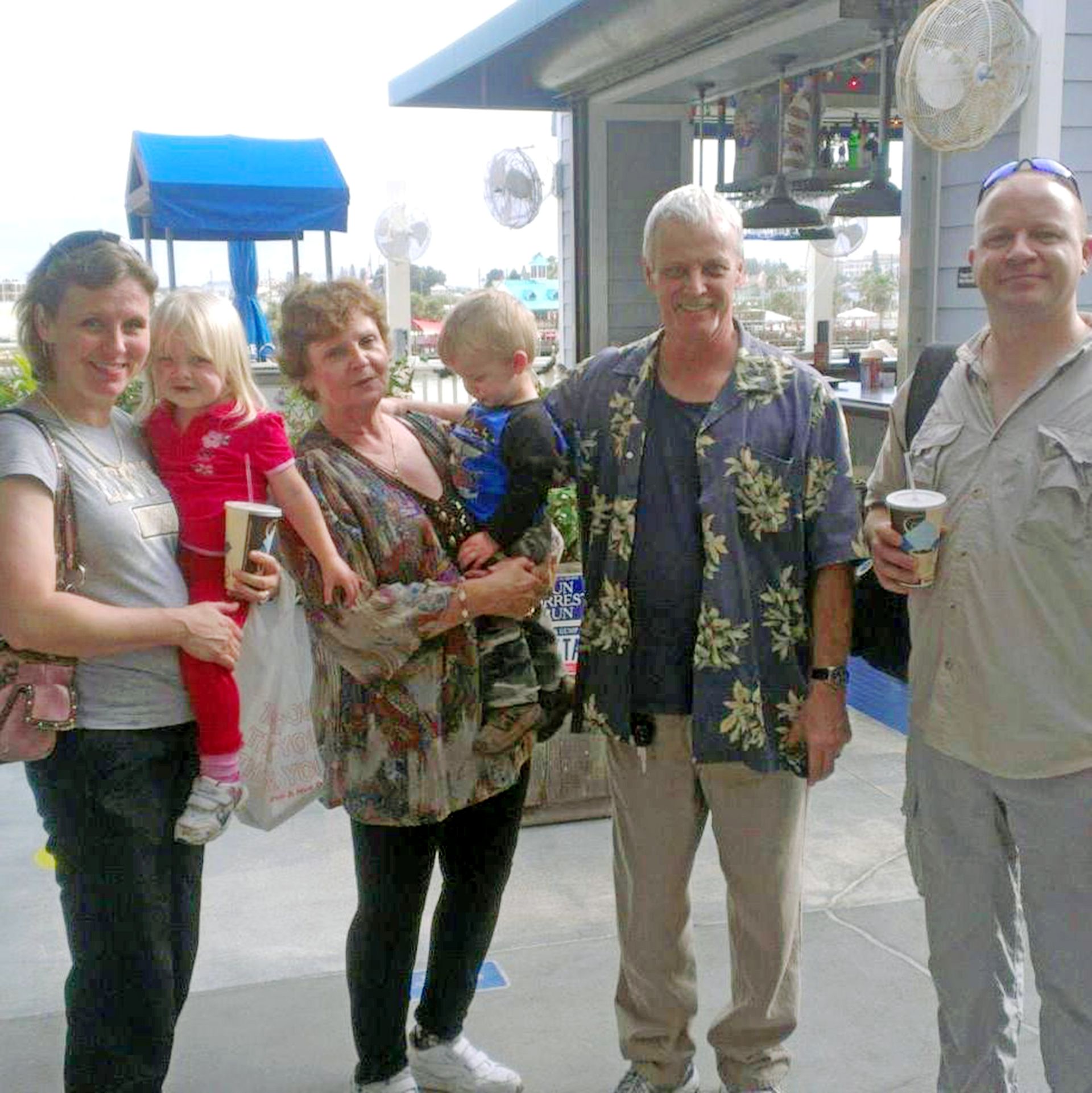 Image of Jim and Annie with family outdoors