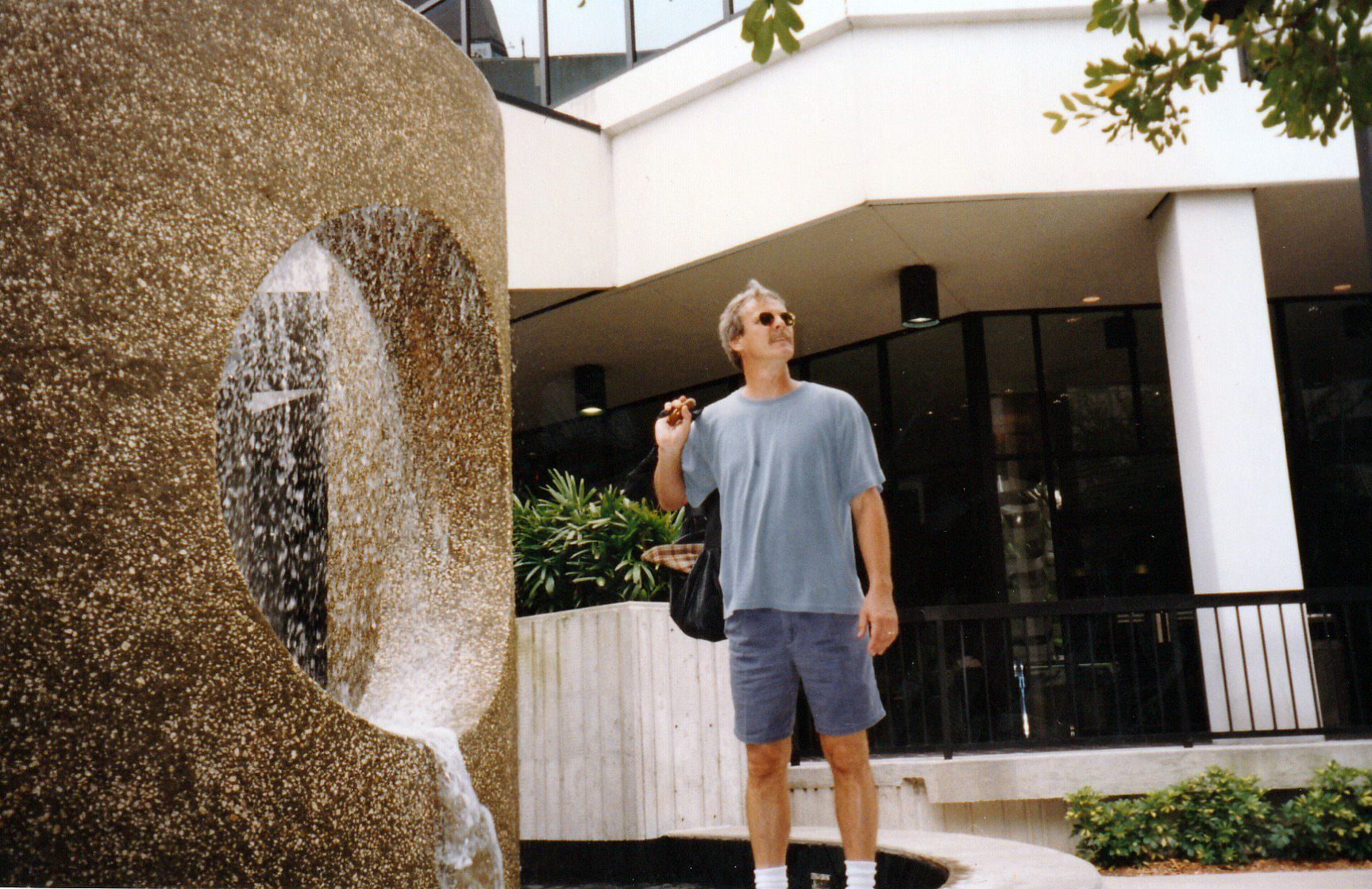 Image of Jim next to museum fountain