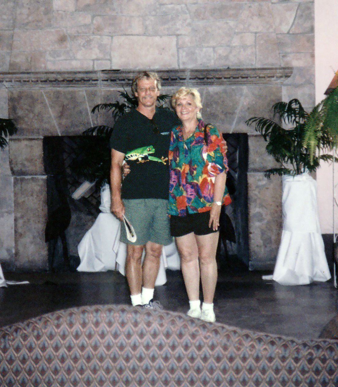Image of Jim and Annie in front of fireplace