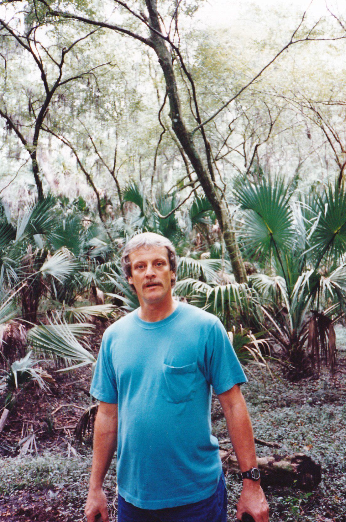 Image of Jim in front of fronds