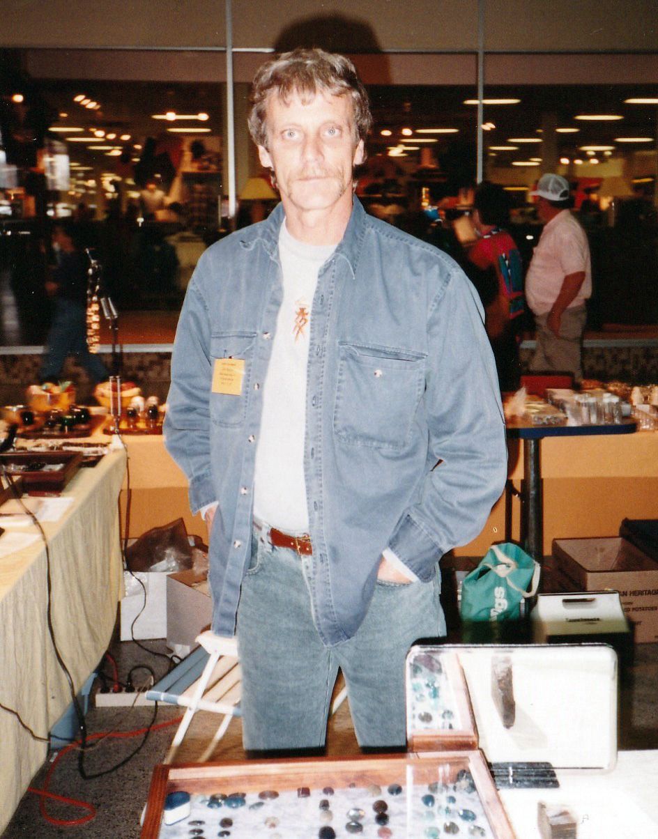 Image of Jim in front of table with polished stones