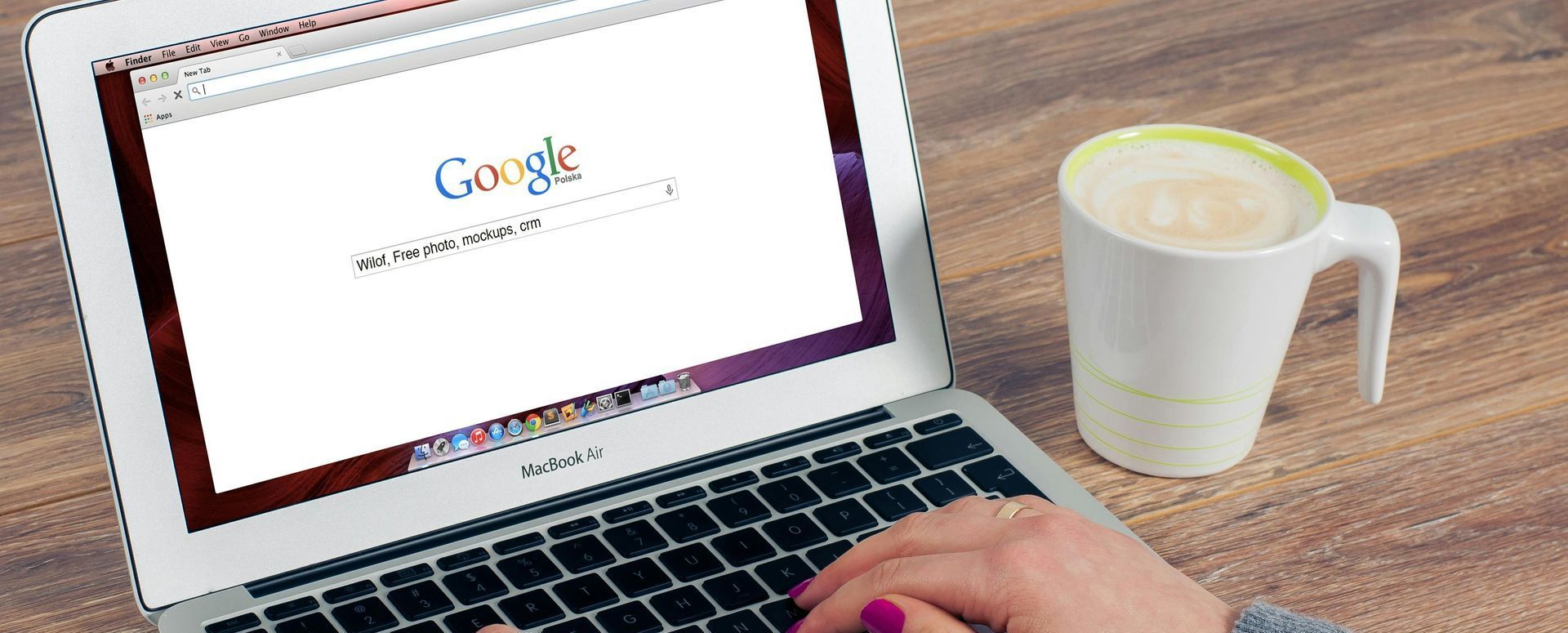 laptop open with google search bar