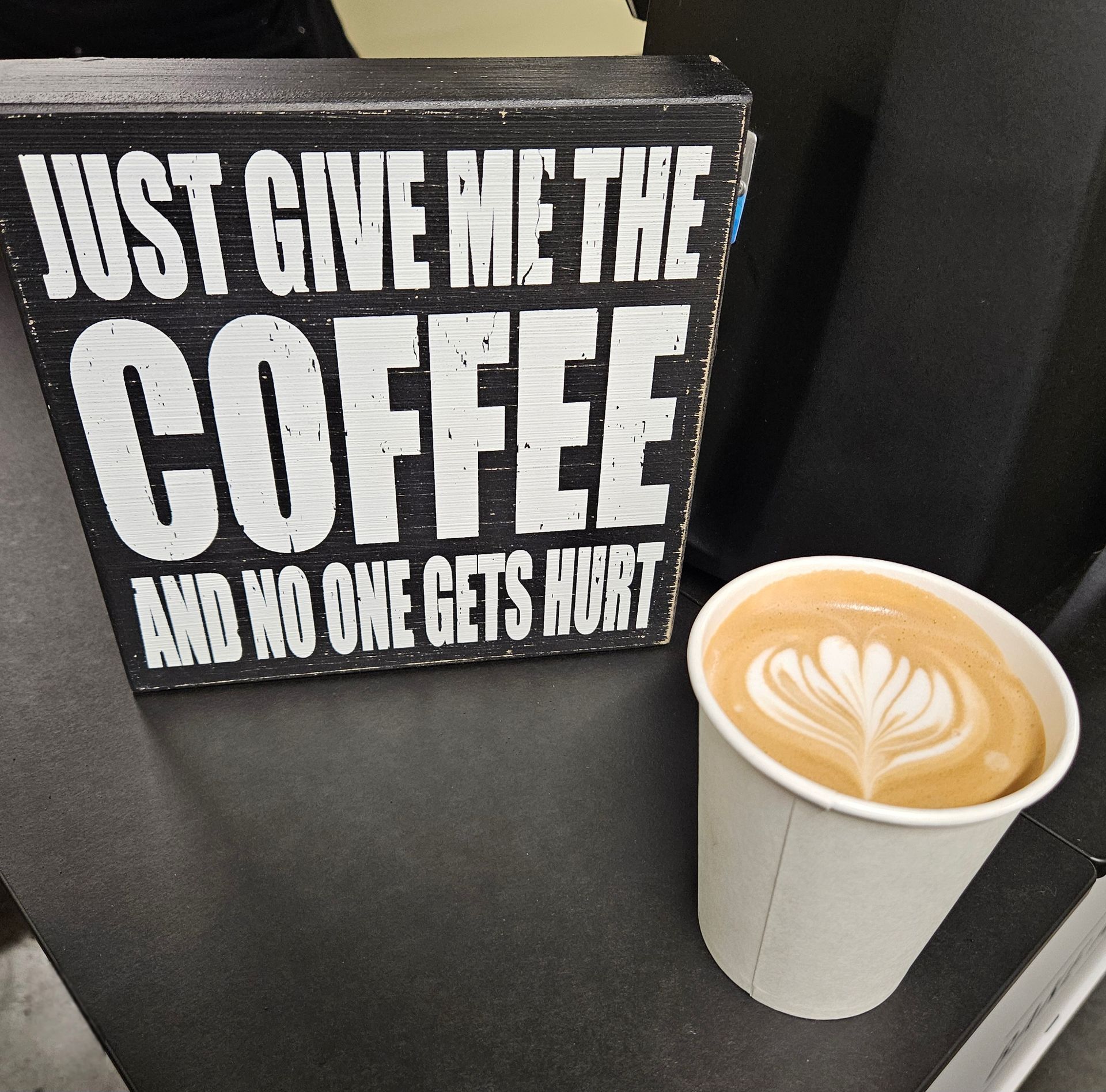 Mobile espresso bar by Bake and Grind serving handcrafted coffee at a wedding, corporate events