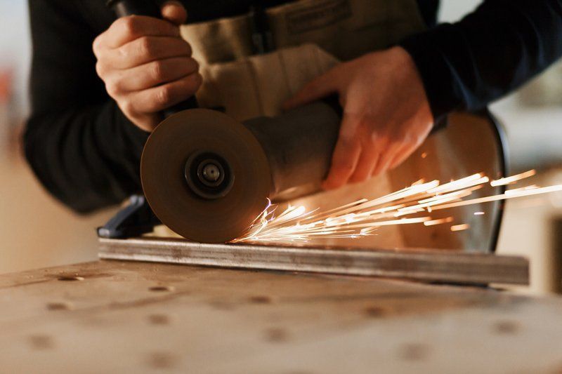 Worker Cutting Scrap Metal — San Diego, CA — Sam's Welding Inc.