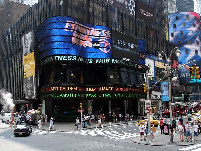 A building with a sign that says fitness news this morning