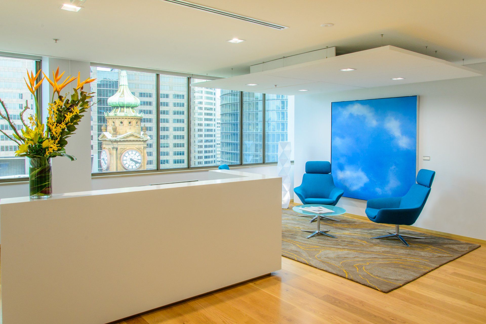 There is a clock tower in the background of the room.