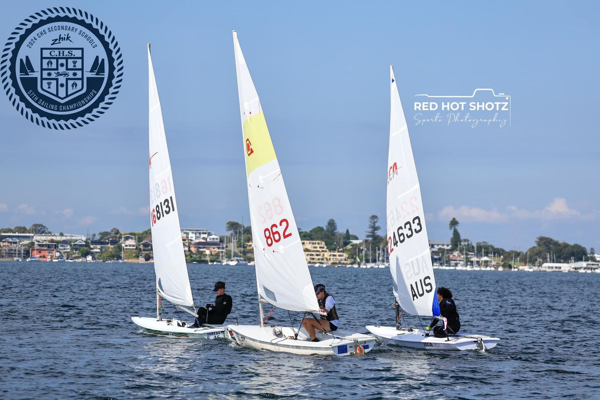 Three Sailboats Racing on a Lake With White Sails — Gosford Sailing Club in Gosford, NSW