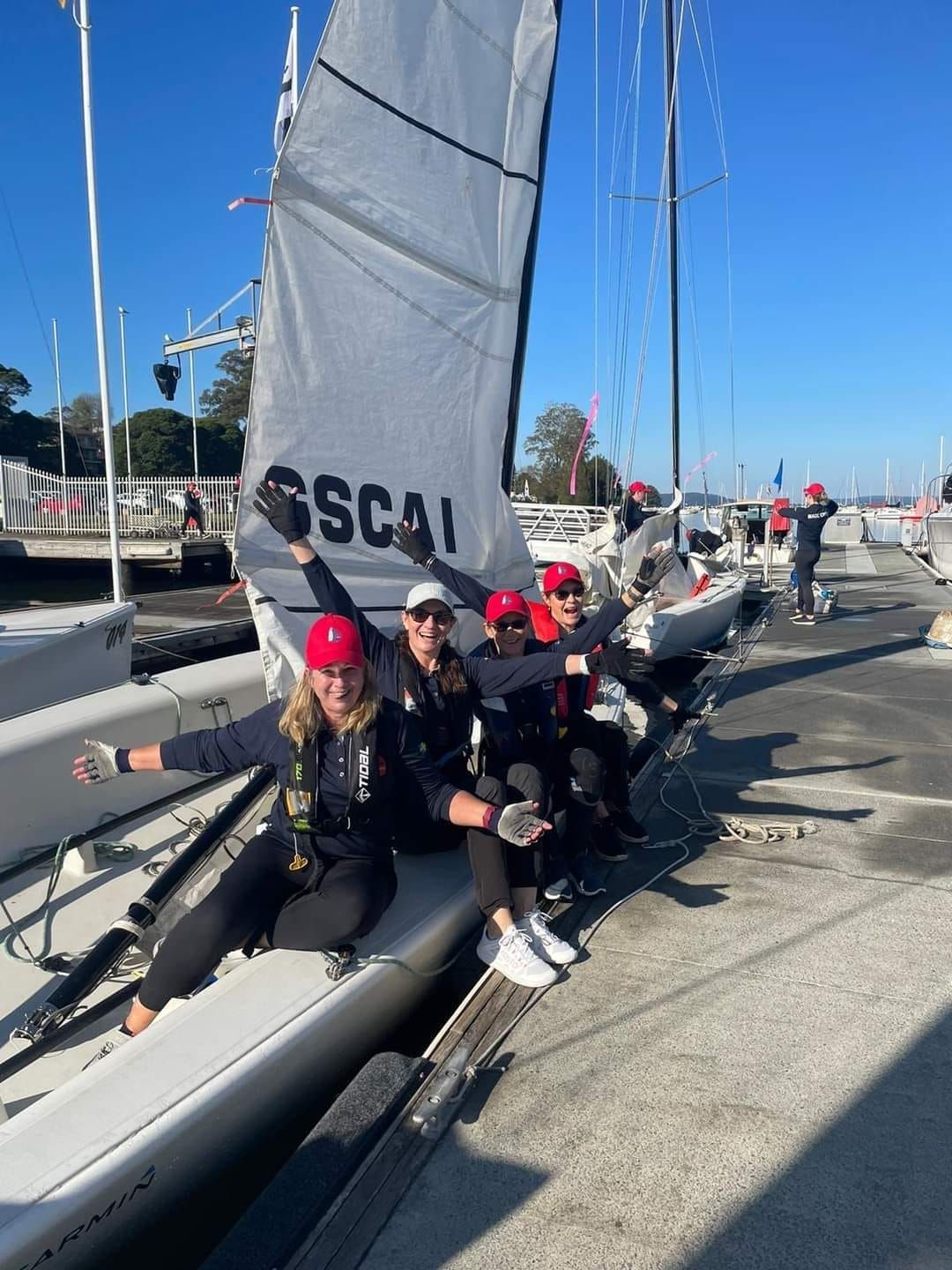 Boats Docked in a Harbor, Reflecting on the Water, at Sunset — Gosford Sailing Club in Gosford, NSW