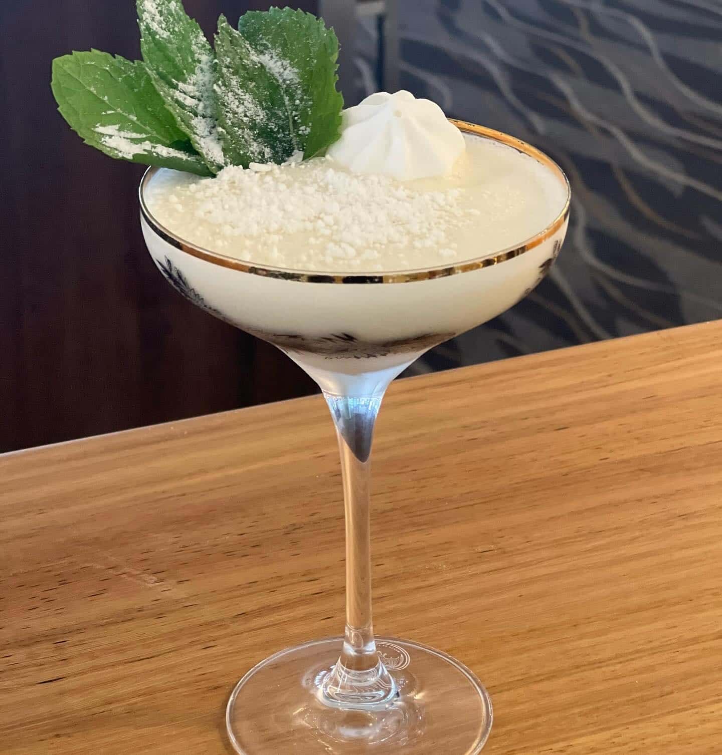 A Martini Glass Filled With Whipped Cream and Mint Leaves — Gosford Sailing Club in Gosford, NSW