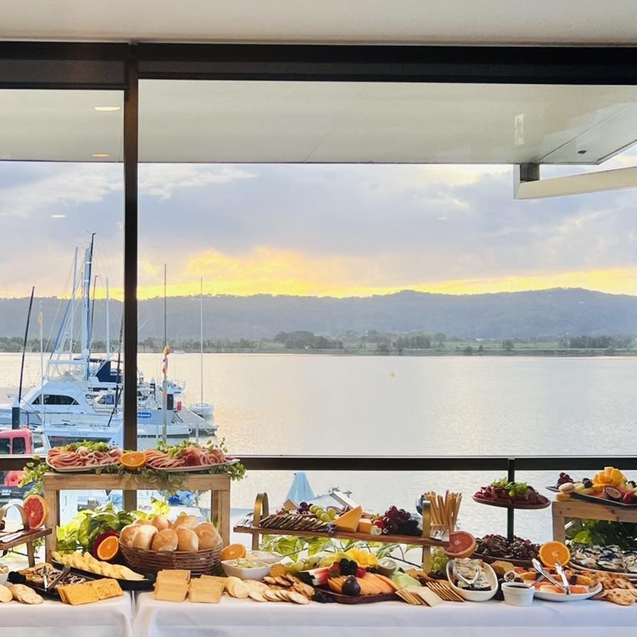 A Buffet Table With a View of a Body of Water — Gosford Sailing Club in Gosford, NSW