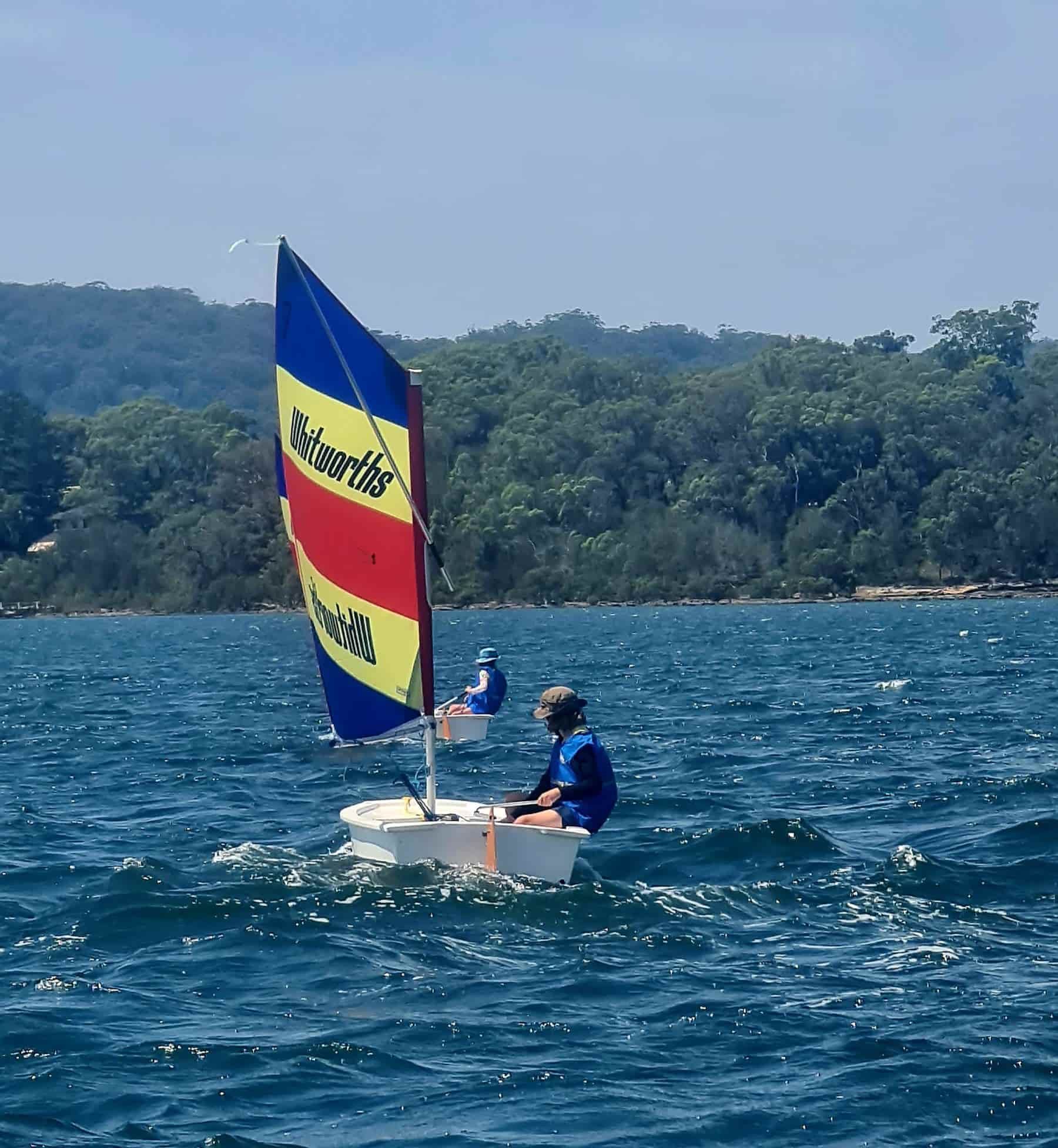 A Man is Sailing a Small Sailboat in the Ocean — Gosford Sailing Club in Gosford, NSW